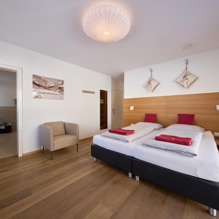 Grischuna Mountain Lodge - Deluxe Doppelzimmer mit Balkon - 3