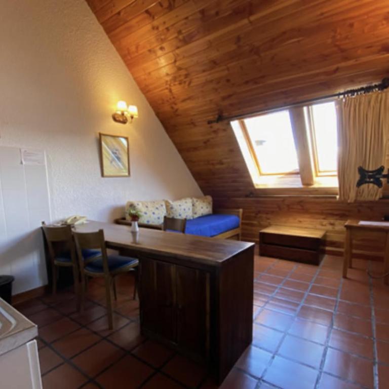 DUT Bariloche - Apartamento de 1 dormitorio con jardín - 18