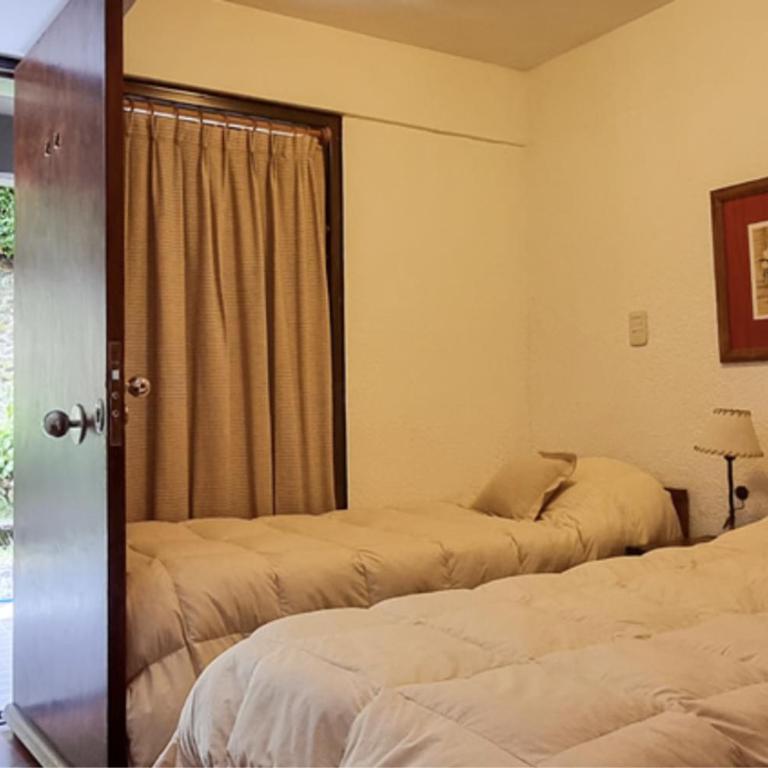 DUT Bariloche - Apartamento de 1 dormitorio con jardín - 19
