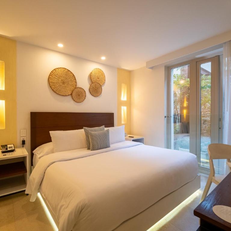 Nacar Hotel Cartagena, Curio Collection by Hilton - Habitación con cama extragrande. - 1