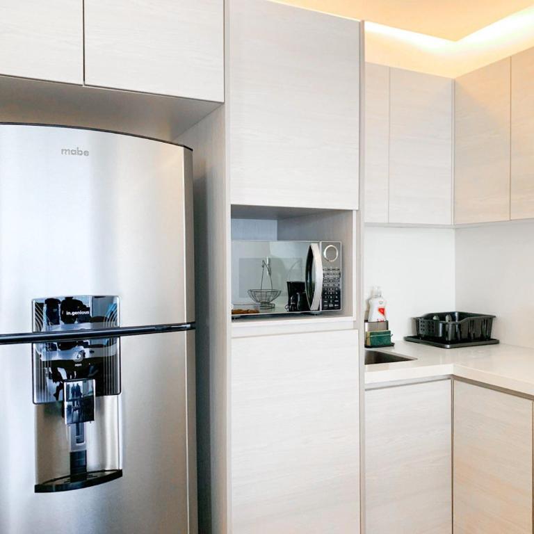 3 camas, vista panoramica, frente a Mall del Sol - Suite with City View - 8