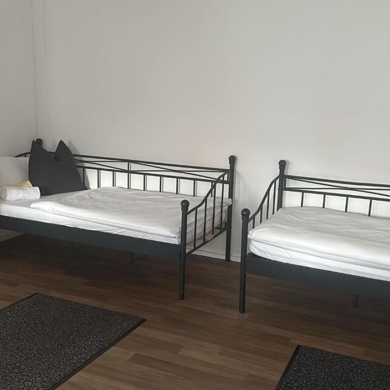 Maffei Apartments - Dreibettzimmer mit Gemeinschaftsbad - 3