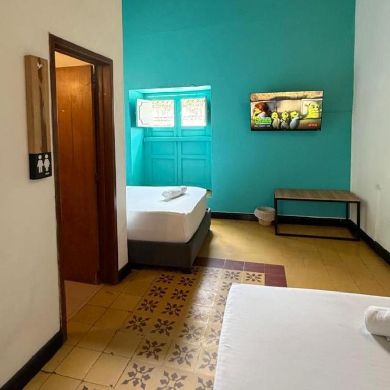 Traveler Hostel - Habitación Triple con baño privado - 2
