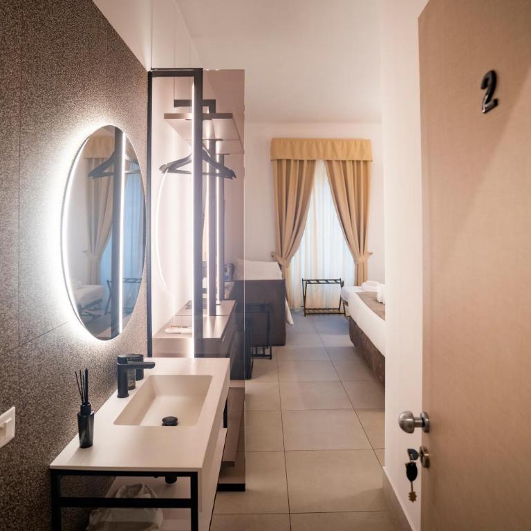 Cicerone's Luxury Suites - Camera King Deluxe - 4