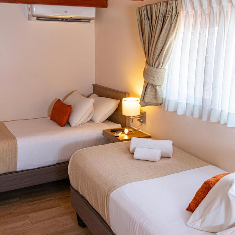 Tagle Hotel Boutique - Twin Room - 4