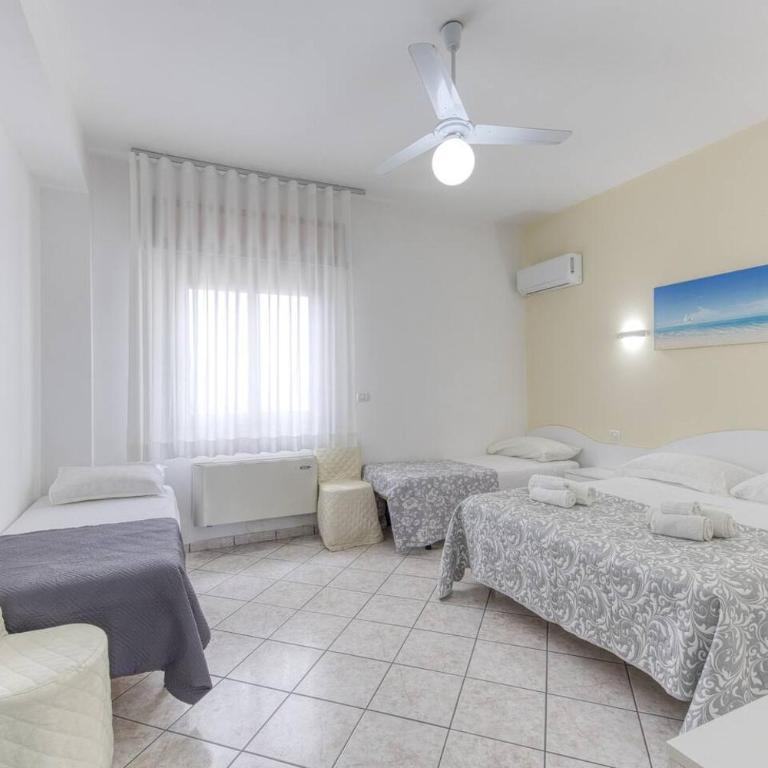Camere almaredamarra a 50 m dalla spiaggia sabbiosa e 200 m dal centro - Camera Quadrupla - 7