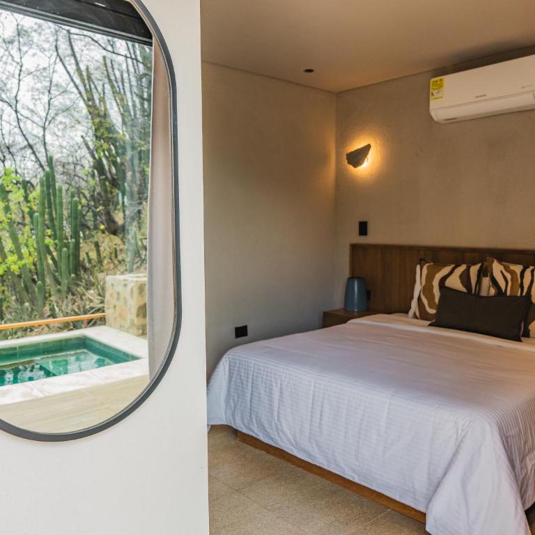 Perla Roca Hotel Boutique - Beach Front - Comfort Quadruple Room - 1