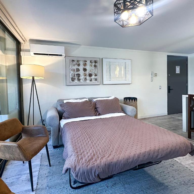 Apartamento a pasos del Parque Arauco con piscina en Las Condes - Aire acondicionado - Two-Bedroom Apartment with Balcony and Terrace - 28