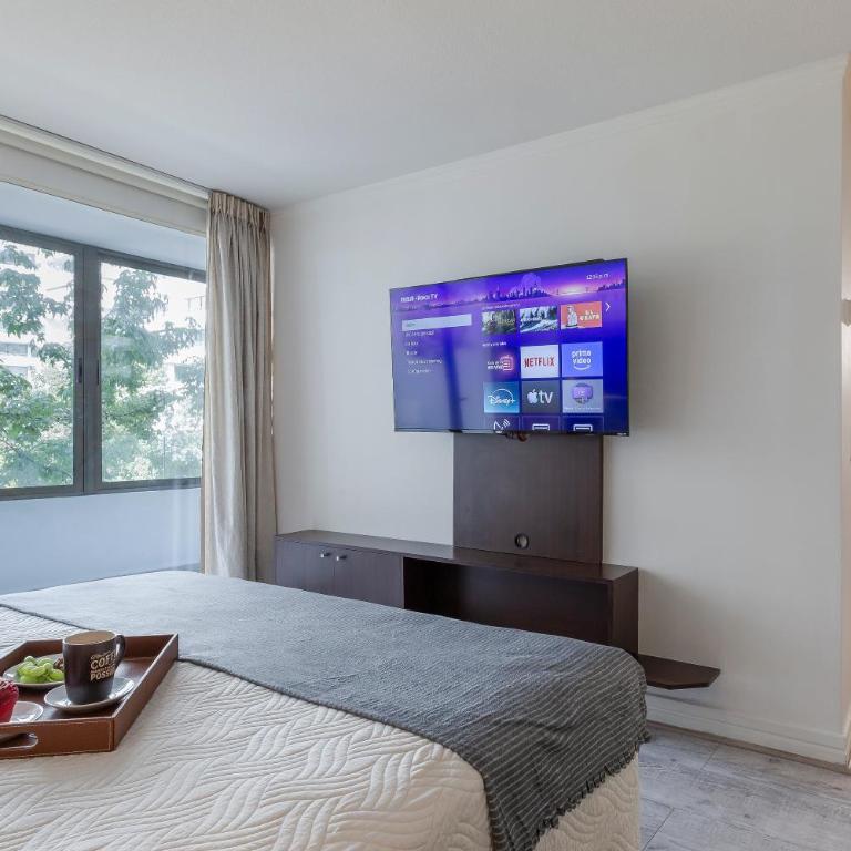 Apartamento a pasos del Parque Arauco con piscina en Las Condes - Aire acondicionado - Two-Bedroom Apartment with Balcony and Terrace - 35