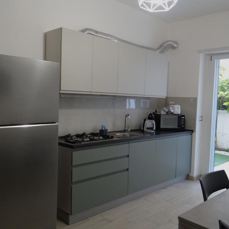 Casa Cinzia con giardino - Appartamento con 2 Camere da Letto - 10