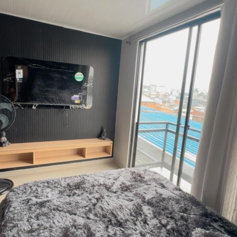 Apartasuite moderno con balcón excelente ubicación - One-Bedroom Apartment - 6