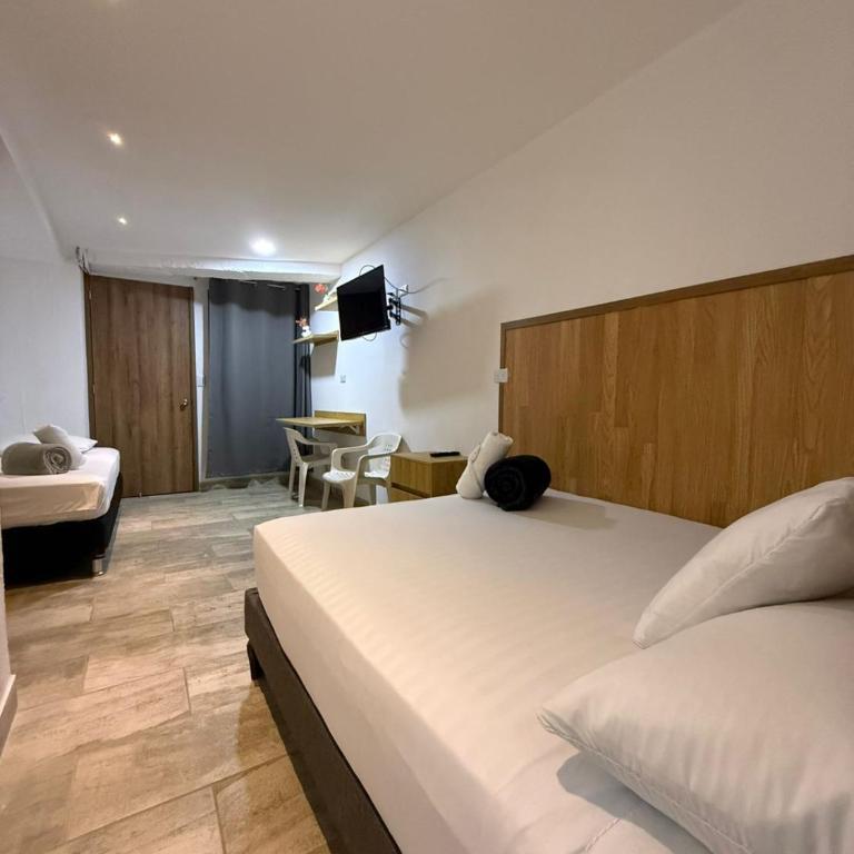 Carriqui Garden Hotel - Classic Triple Room - 1