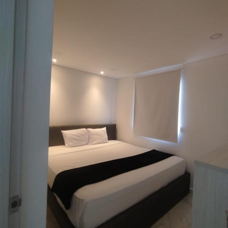 Apartment close to the beach and airport - Three-Bedroom Apartment with Balcony - 1
