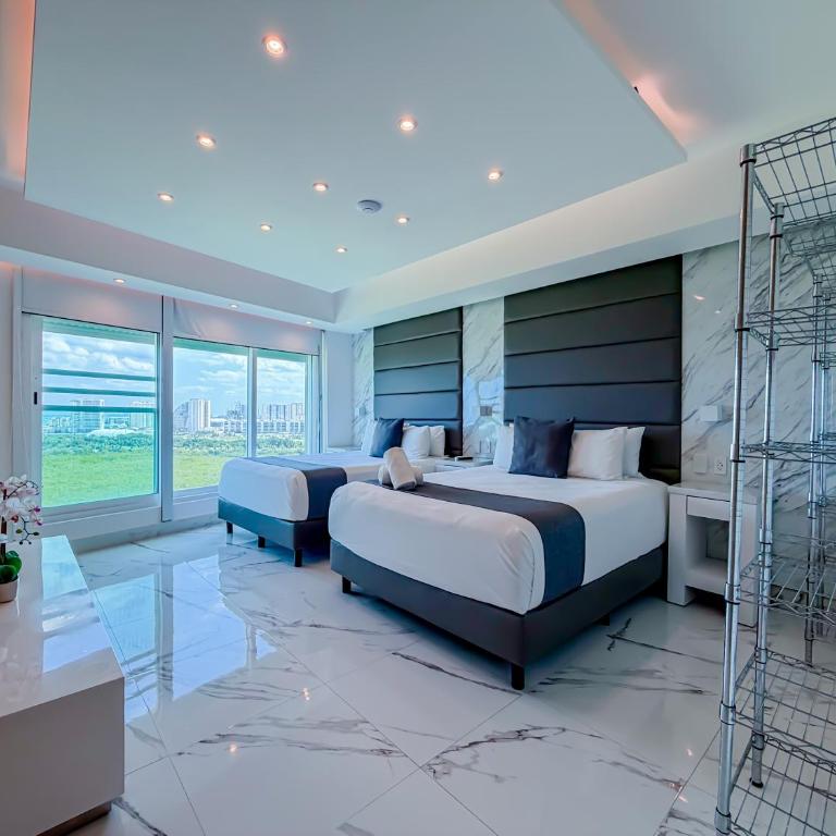 Departamento Vista al mar y Puerto Cancún - Three-Bedroom Apartment - 26