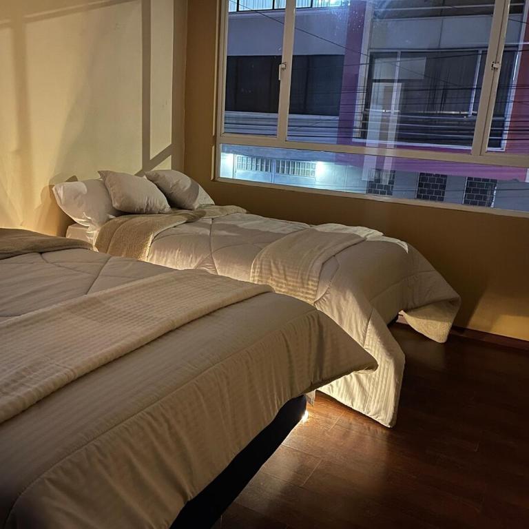 Casa en el centro de la ciudad con excelente ubicación - Three-Bedroom Apartment - 9