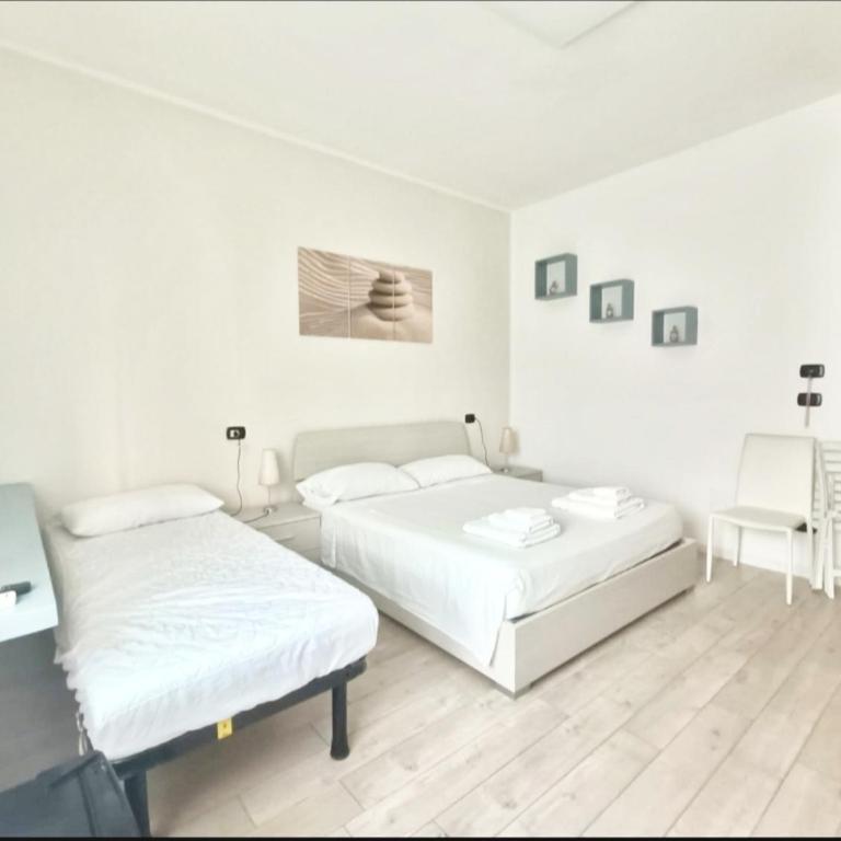 Redroom-house - Camera Matrimoniale Deluxe con 1 Letto Supplementare - 11