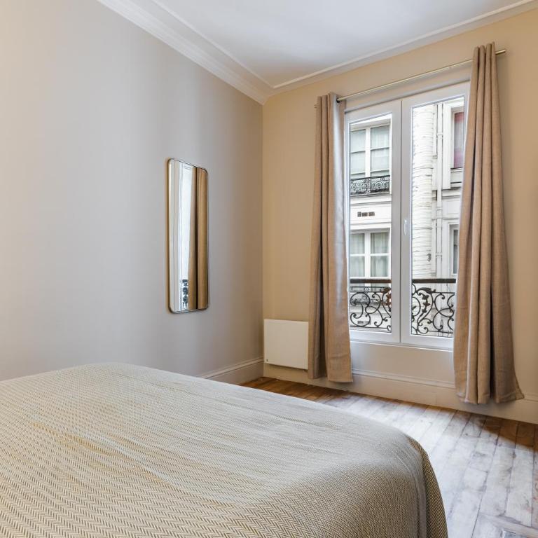 Elegant 3-Bedroom Apartment in the Heart of Historic Paris - Three-Bedroom Apartment - 13