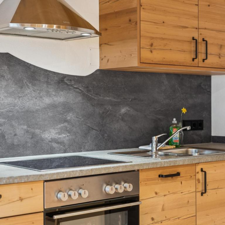 Bergzeit für Familien mit Garten - Deluxe Apartment mit 1 Schlafzimmer und Gartenblick - 13