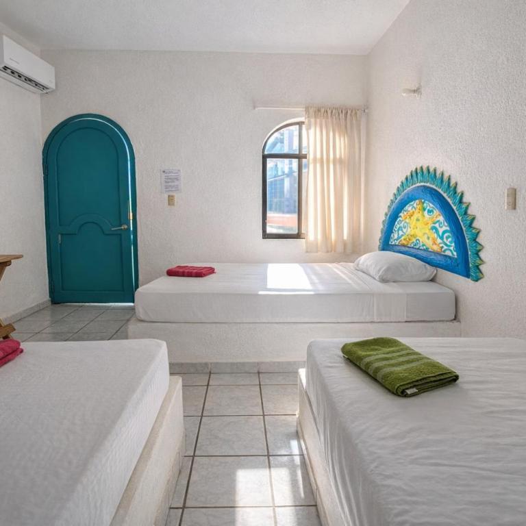 Kaia Beach Hotel - Habitación Triple con baño privado - 1