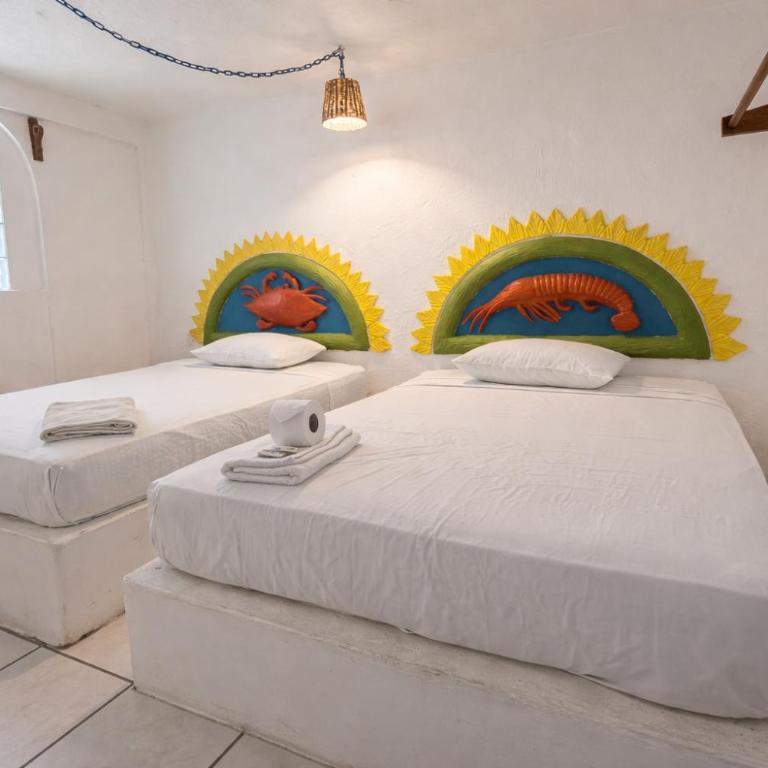 Kaia Beach Hotel - Habitación Doble con baño privado - 2 camas - 5