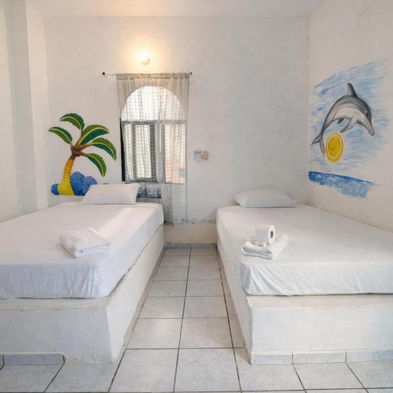 Kaia Beach Hotel - Habitación Doble con baño privado - 2 camas - 2