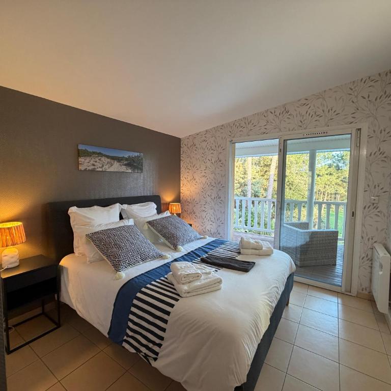 Villa Luxe piscine chauffée, 4 chambres, surplombant le golf entre océan & lac Plage à 5 min - Villa - 31