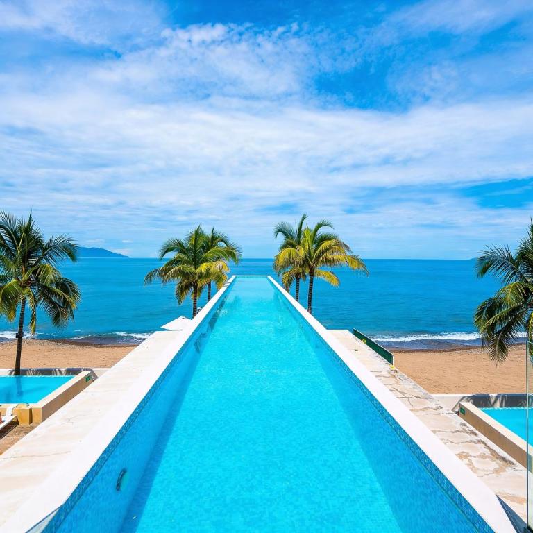 Stylish Oceanfront 2BR - Balcony with Sunset Views, Pools, Beach & Gyms - Apartment - 6