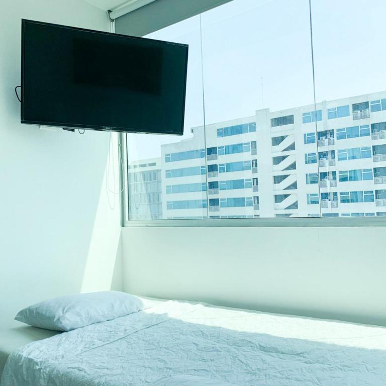 Departamento de 2 habitaciones frente a Mall del Sol - 5 min del aeropuerto - Two-Bedroom Apartment - 31