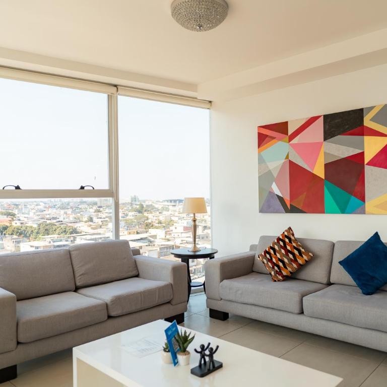 Departamento de 2 habitaciones frente a Mall del Sol - 5 min del aeropuerto - Two-Bedroom Apartment - 1