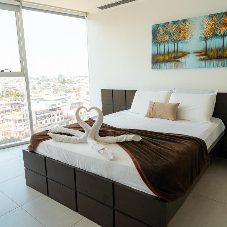 Departamento de 2 habitaciones frente a Mall del Sol - 5 min del aeropuerto - Two-Bedroom Apartment - 2