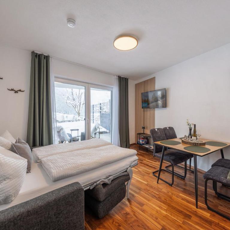 Apartment Alpenweiss - Apartment mit 1 Schlafzimmer und Garten - 12