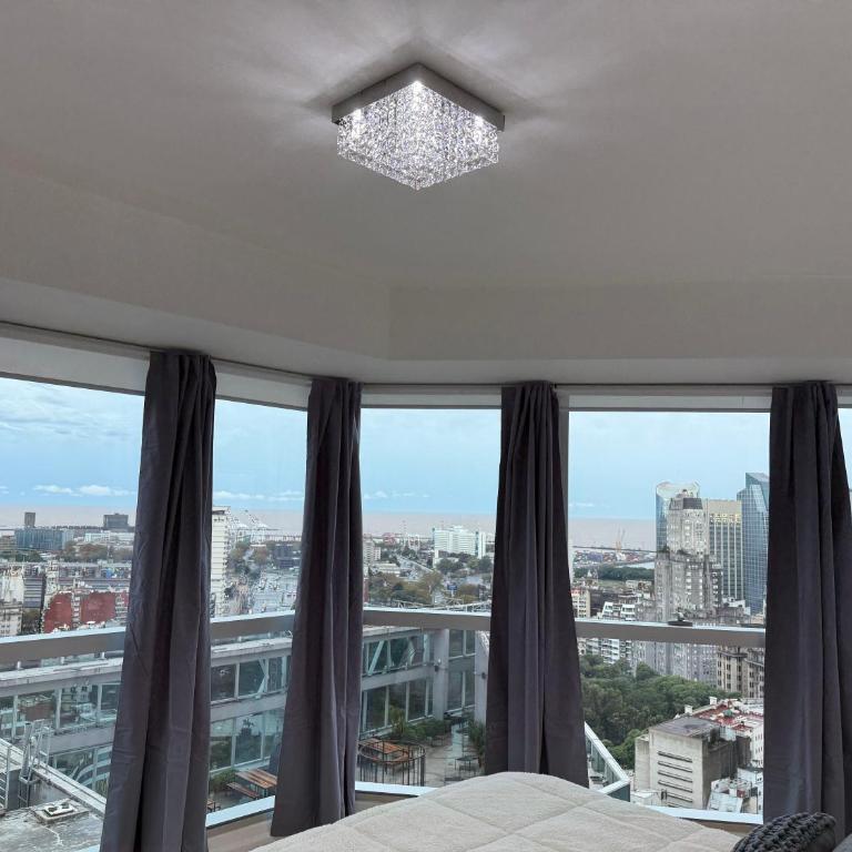 Departamento Premium en la famosa Torre Bellini, en el centro, con piscina, jacuzzi, gimnasio y vista increible a la ciudad de Buenos Aires, capacidad máxima 5 personas - Apartamento de 1 dormitorio - 2