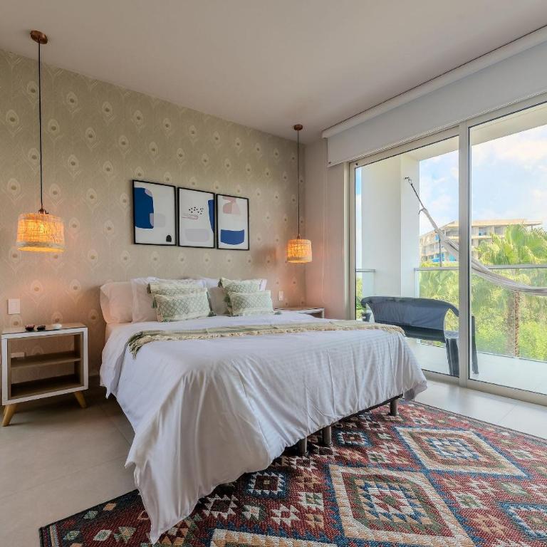 Oceanfront condominium with direct beach access Morros IO - Deluxe One-Bedroom Apartment - 13