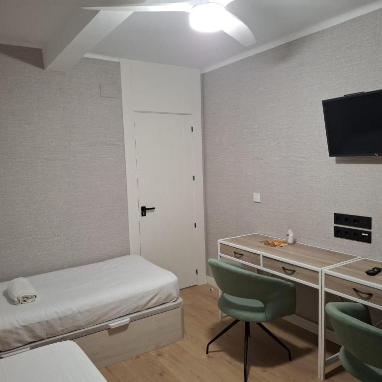 Apartamento playa Ondarreta - Habitación Familiar con baño privado - 8