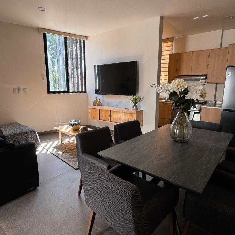 Cielo Suites - Apartamento de 2 dormitorios con vistas al jardín - 1