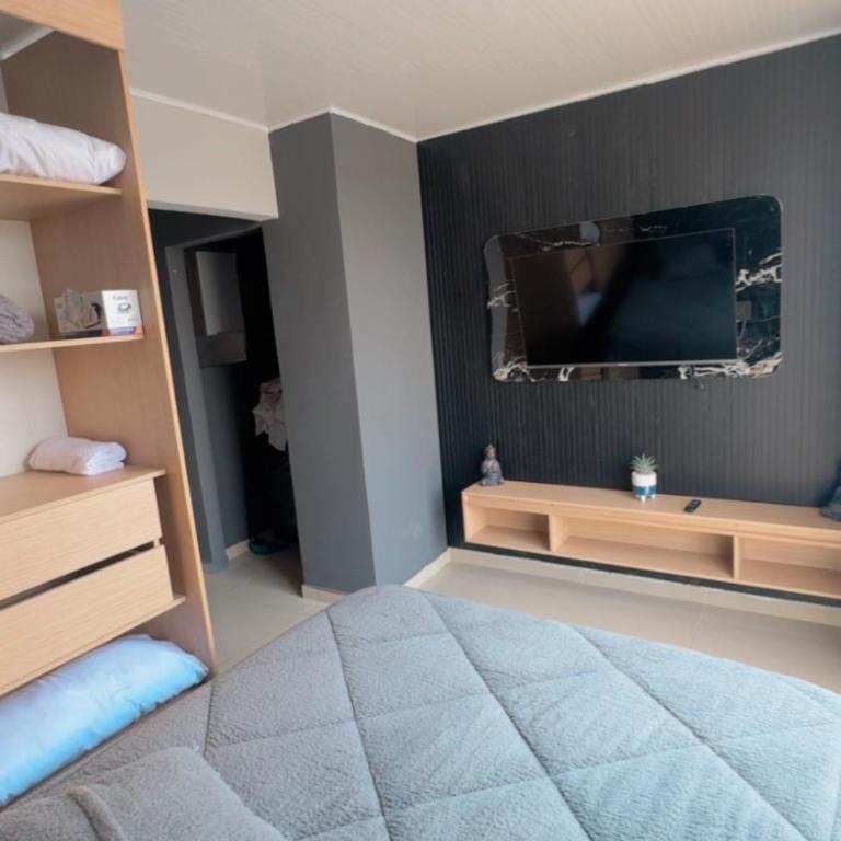 Apartasuite moderno con balcón excelente ubicación - One-Bedroom Apartment - 33