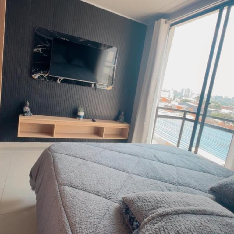 Apartasuite moderno con balcón excelente ubicación - One-Bedroom Apartment - 31