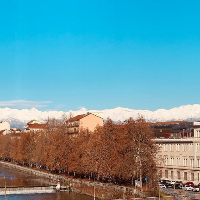 Elegante soggiorno Giardini Reali Torino Centro - Appartamento Familiare con 2 Camere da Letto e Vista - 23