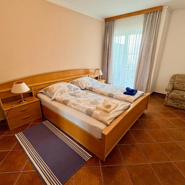 Appartementhaus Karantanien am Ossiacher See - Apartment mit 1 Schlafzimmer, Balkon und Seeblick - 3