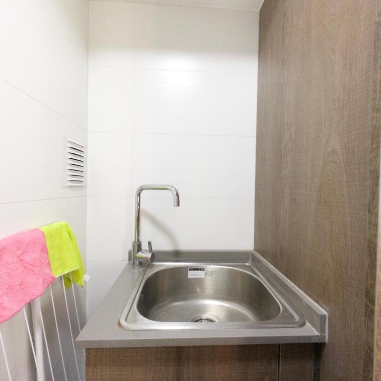 AT HOME El Golf - Three-Bedroom Apartment - 23