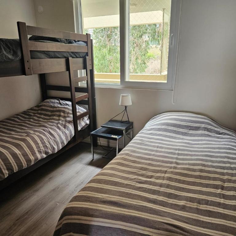 Departamento Familiar con Terraza Panorámica y a Pasos de la Playa en Punta Puyai - Two-Bedroom Apartment - 21