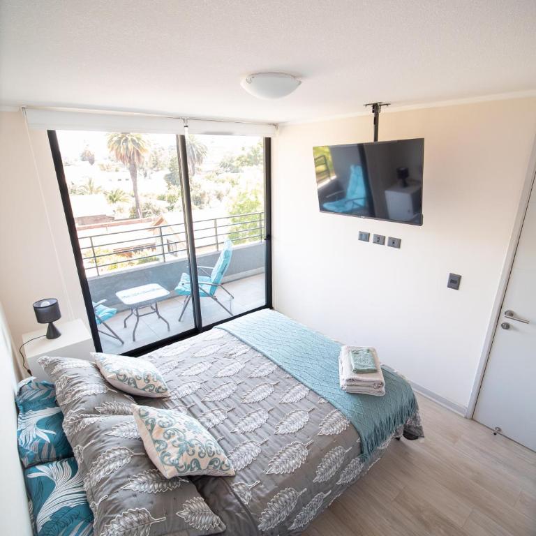 Cerca del Movistar Arena Fantasilandia Republica Club Hípico Metro Centro de Santiago - Two-Bedroom Apartment with Balcony - 10