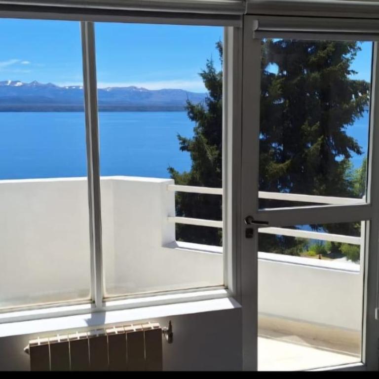 Hermoso Departamento frente al Lago con cochera - Apartamento de 2 dormitorios - 12