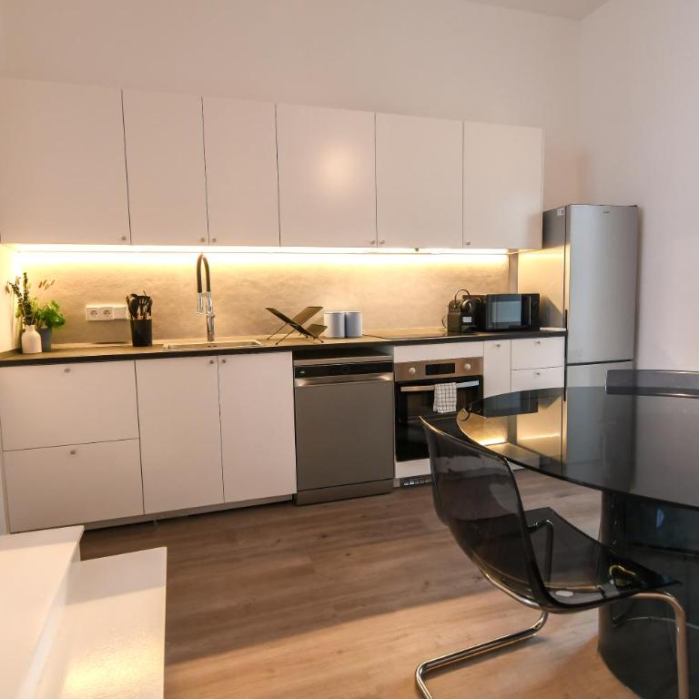 Contemporary Chic with Expansive Sun Patio - Two-Bedroom Apartment - 17