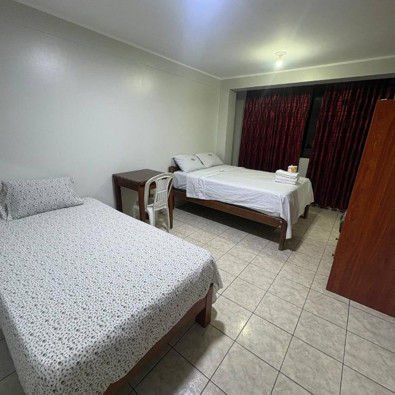 Hospedaje W TAWA - Habitación Doble Deluxe - 2 camas dobles - 5