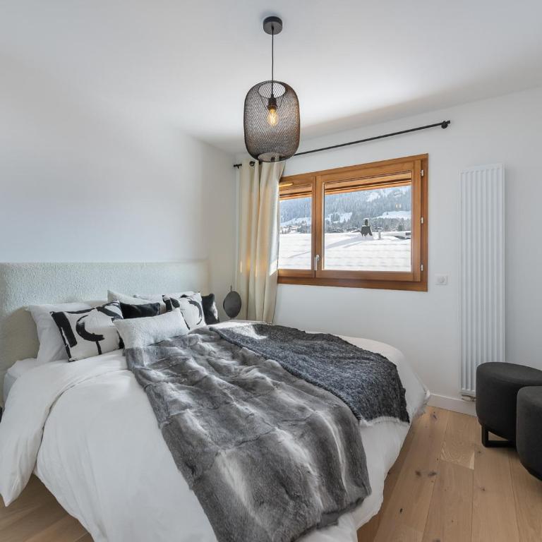 Neuf 3P avec parking et services inclus à Megève - FR-1-569-70 - Appartement - 3