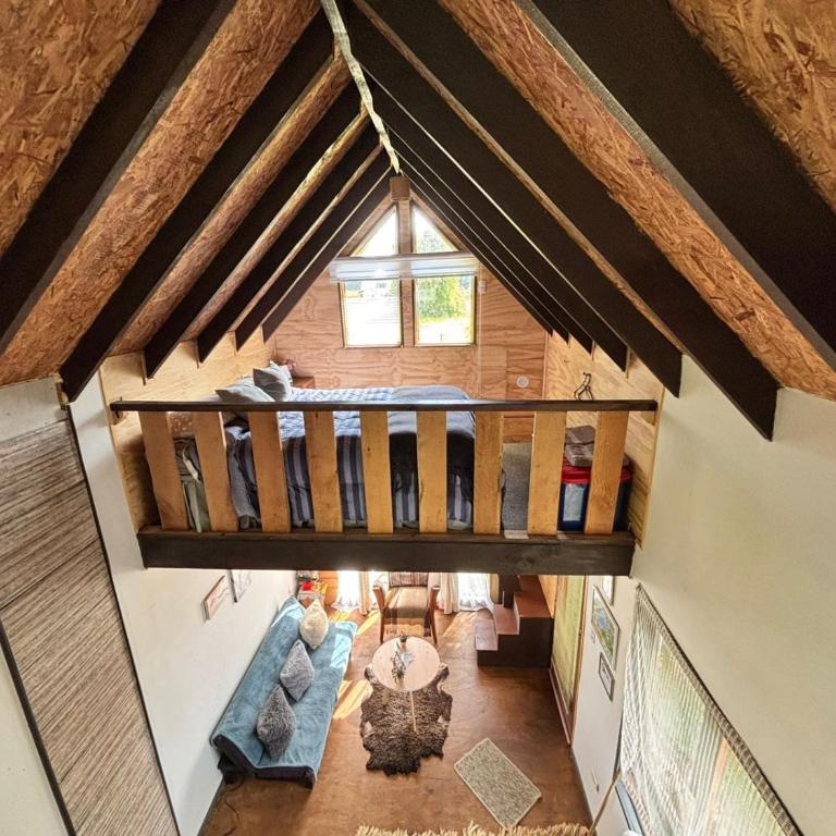 Tiny House, Tiny Black Frutillar - Family Room with Garden View - 25
