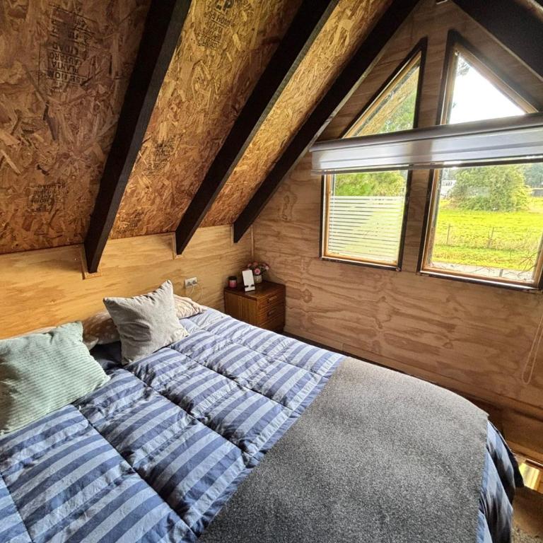 Tiny House, Tiny Black Frutillar - Family Room with Garden View - 29
