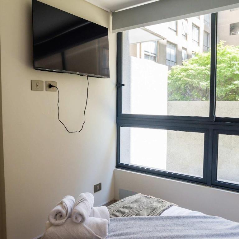 Stylish 2BR Apt in Santiago for 5 Gym Access - Apartment - 24