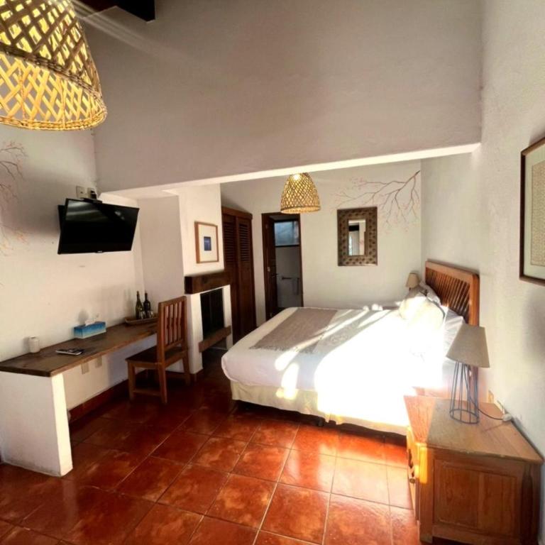 Hotel las Caballerizas - Habitación Cuádruple - vistas al jardín - 1